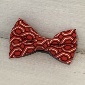 Fliege orange gemustert